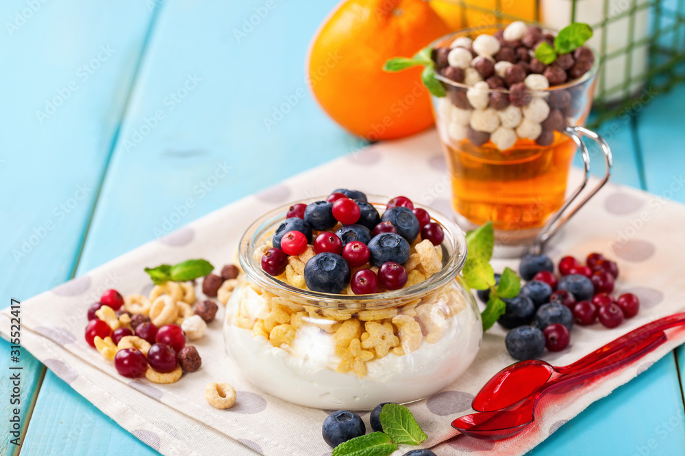 Yogurt with cereal and berries. Selective focus. Copy space Yogurt with cereal and berries. Selective focus. Copy space