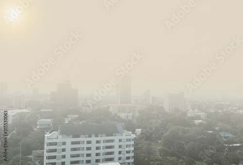 Bad weather and air pollution with pm 2.5 dust in city scape