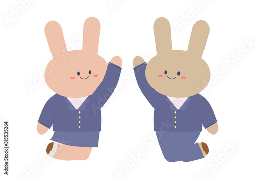 ハイタッチをする制服を着た学生うさぎ