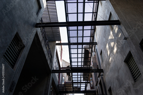 The sky in alley with loft architecture Concrete Cement style . Modern chinese loft architecture background