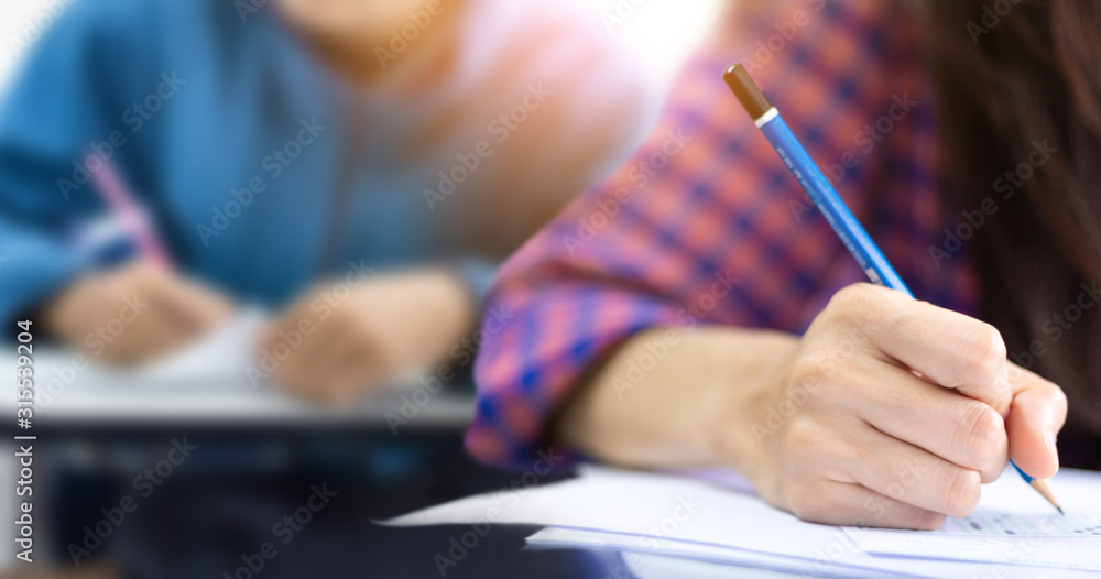 high school,university student study.hands holding pencil writing paper ...