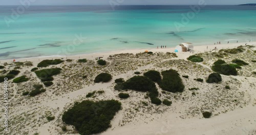 Wallpaper Mural Aerial Drone Shot of a beautiful Beach in Spain with People walking on it, 4k UHD Torontodigital.ca