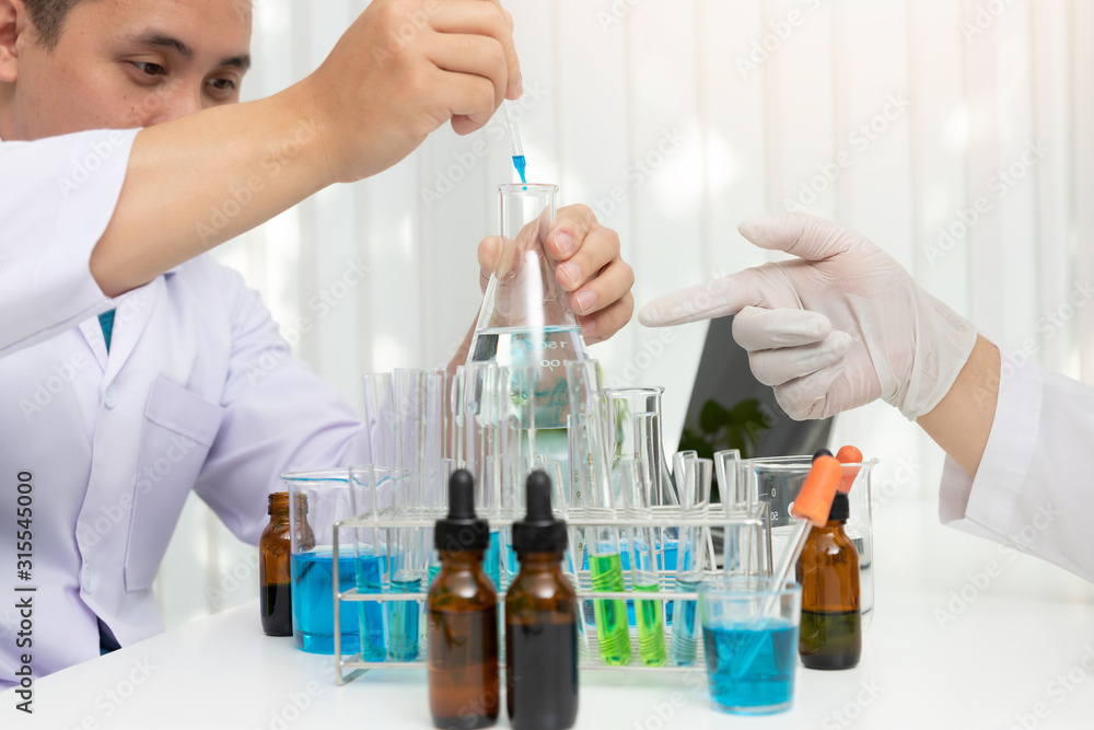 Fototapeta premium Research and development concept, Laboratory scientist working at lab with test tubes about medicine