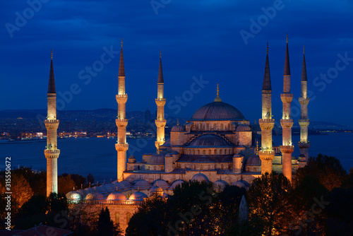 Blue Mosque with lights at dusk on the Bosphorus Sultanahmet Istanbul Turkey