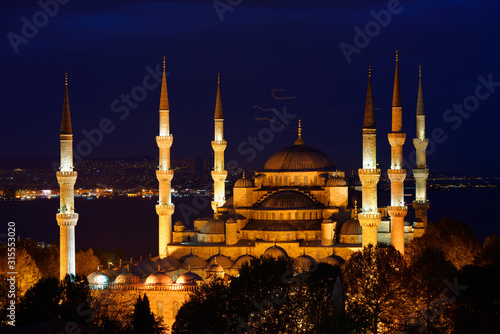 The Blue Mosque lit at twilight on the Bosphorus in Sultanahmet Istanbul Turkey