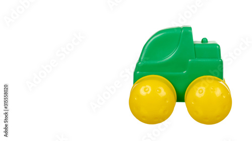 Plastic green toy car with big yellow wheels.