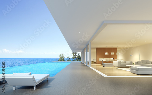 Perspective of modern luxury building with terrace and swimming infinity pool on sea view background,Idea of family vacation. 3D rendering.