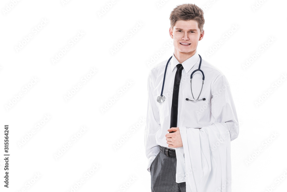 in full growth.portrait of a young doctor. in full growth.portrait of a young doctor.