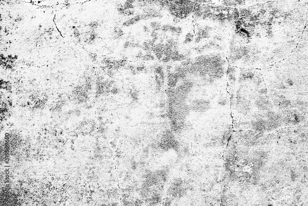 Fototapeta premium Texture of a concrete wall with cracks and scratches which can be used as a background