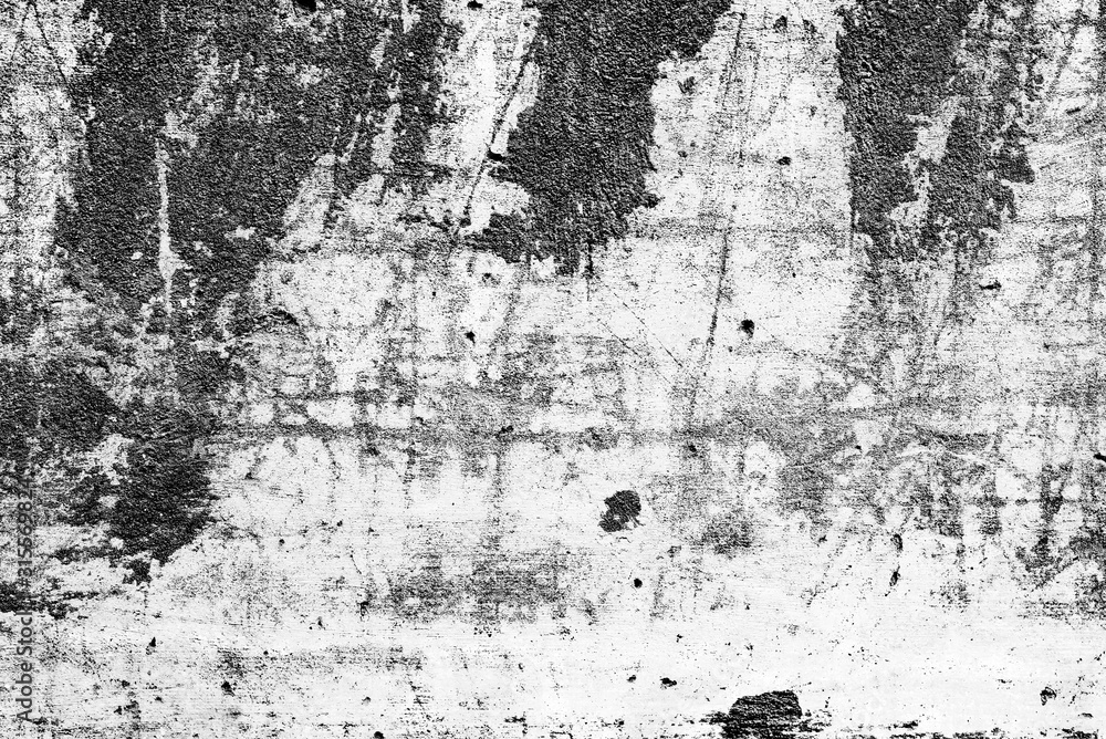 Texture of a concrete wall with cracks and scratches which can be used as a background Texture of a concrete wall with cracks and scratches which can be used as a background