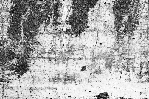 Fototapeta Naklejka Na Ścianę i Meble -  Texture of a concrete wall with cracks and scratches which can be used as a background