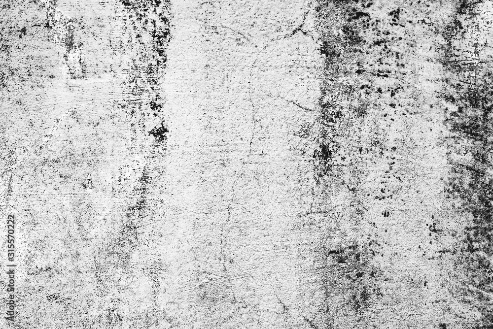 Fototapeta premium Texture of a concrete wall with cracks and scratches which can be used as a background