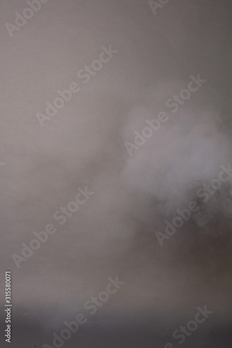 Smoke on a photographic background in the studio 50 MP