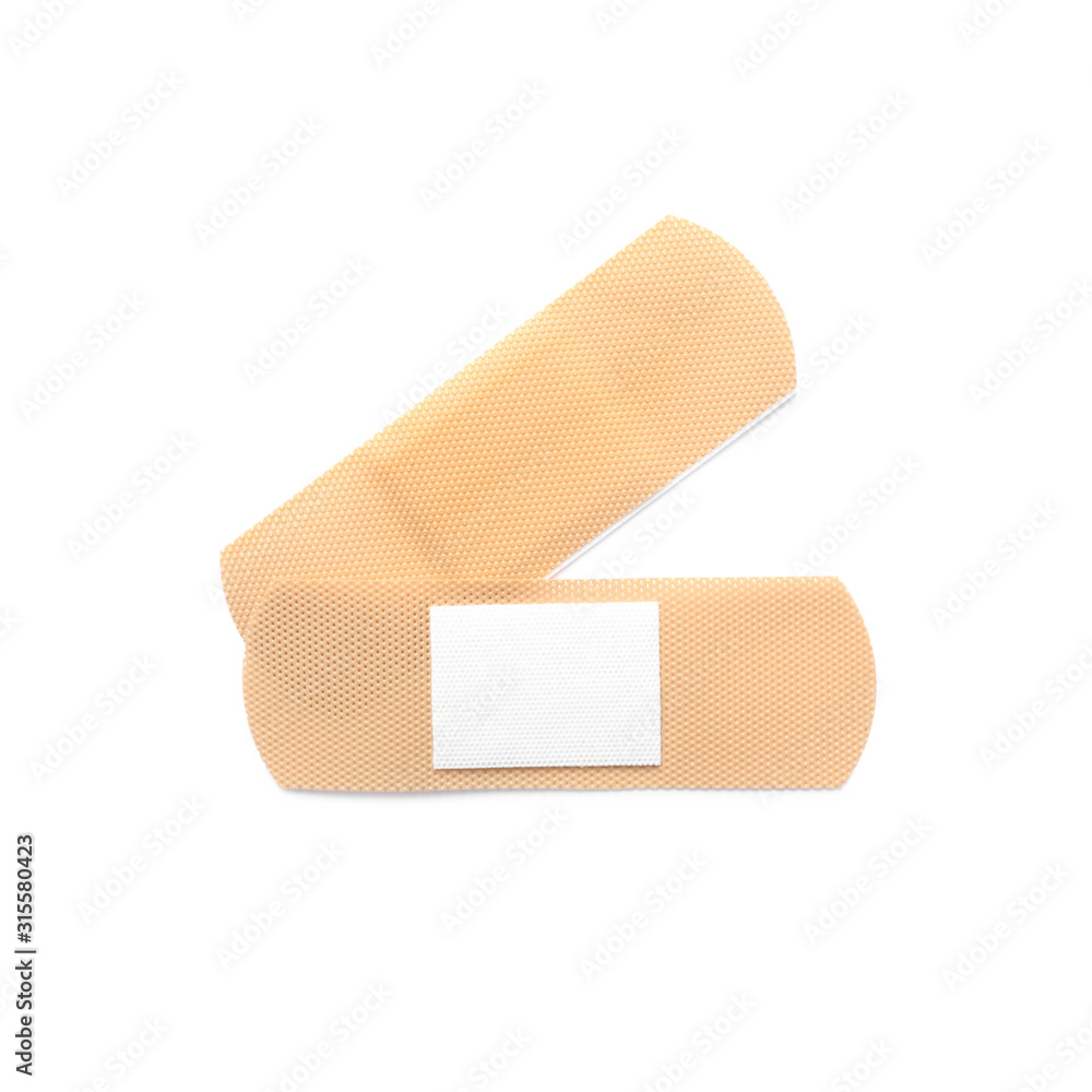 Medical sticking plasters isolated on white. First aid item Medical sticking plasters isolated on white. First aid item