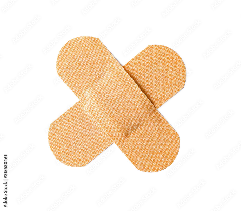 Medical sticking plasters isolated on white. First aid item Medical sticking plasters isolated on white. First aid item