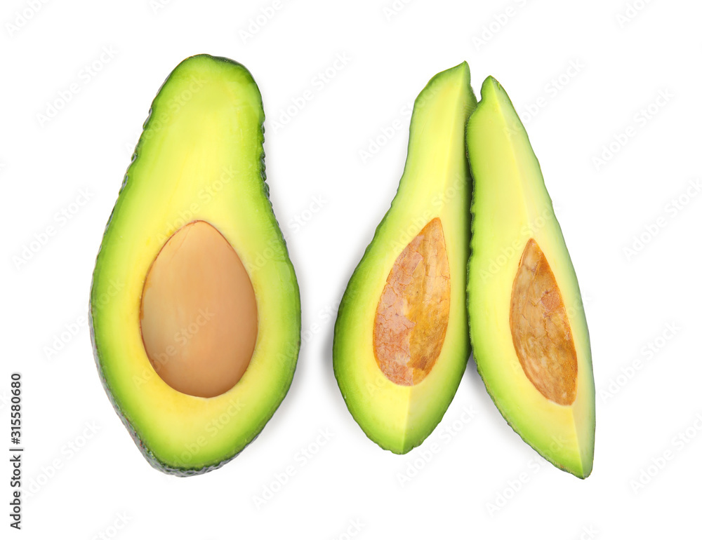 Tasty ripe avocados on white background, top view. Tropical fruit