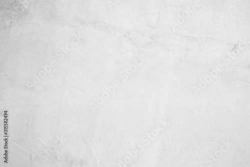 White concrete wall for interior or outdoor exposed surface polished. Cement have sand and stone of tone vintage, Grey natural concrete loft patterns old antique, design work floor texture background.