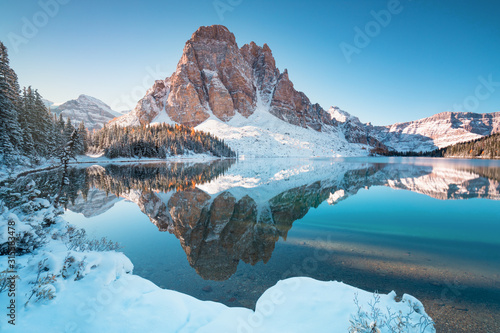 First snow Morning at Lake in Mount Assiniboine Provincial Park Canada Snow-covered winter mountain lake in a winter atmosphere. Nature in Rocky mountains. Beautiful background photo concept. photo