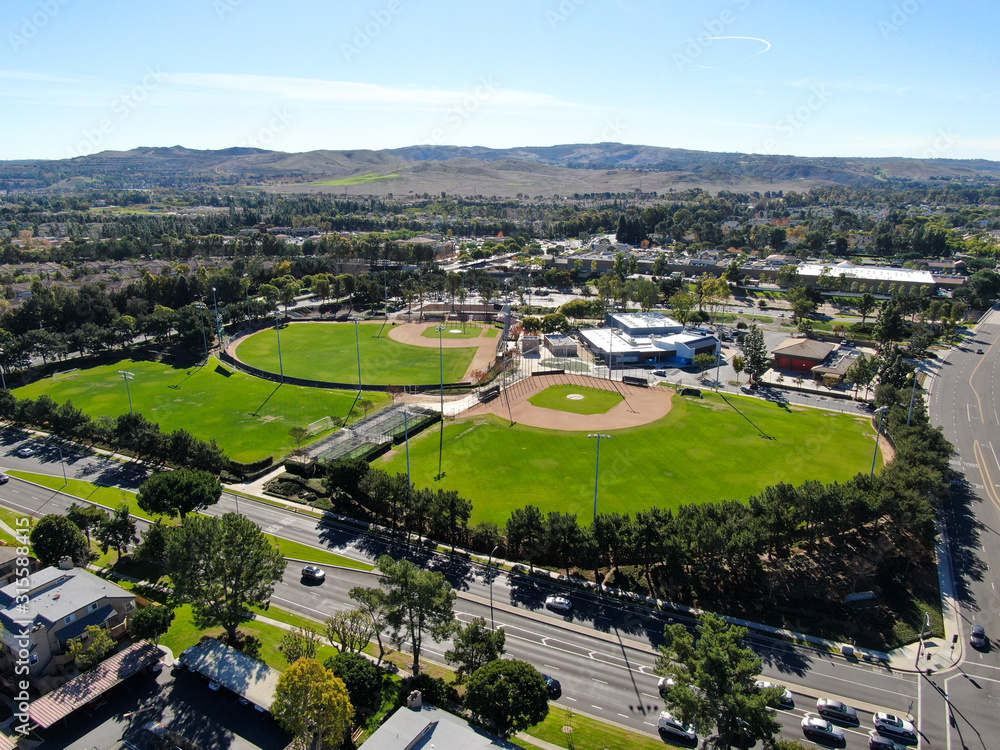 Aerial top view of Community park baseball sports field. Irvine, San Diego, USA