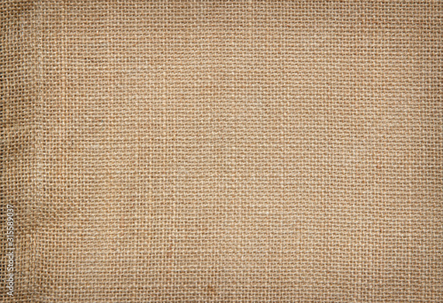 Brown Hemp rope texture background. Sackcloth or blanket wale linen wallpaper. Rustic sack canvas fabric texture in natural. Haircloth vintage linen burlap weaving, Old beige carpet background.