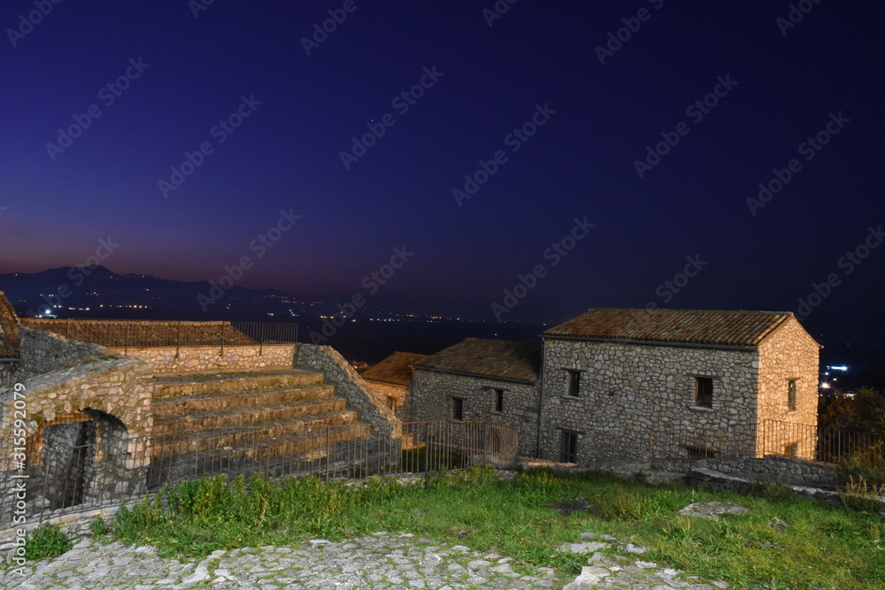 Night view of the houses of a medieval village in Italy