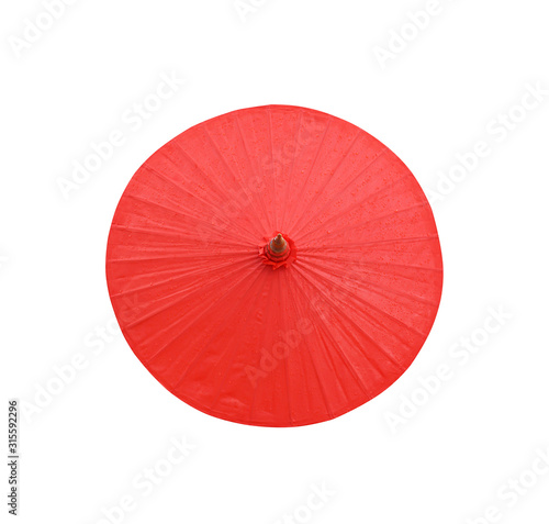 Red oil paper umbrella with water drops top view isolated on white background and clipping path