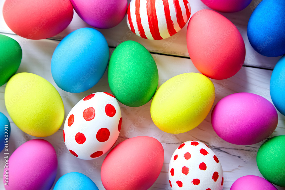 Easter eggs background. Many colorful eggs, top view