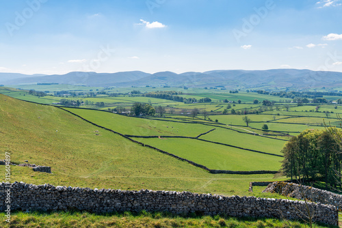 Landscape in the Eden District of Cumbria, seen on the B6260 road near Orton, England, UK photo