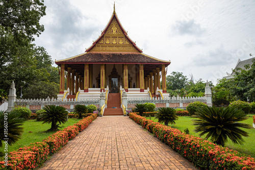 The Architecture and Ancient Buddha image and Sculpture Detail of (Hor Pha keo Museum).Haw Pha Kaew Museum in Vientiane, Laos. photo