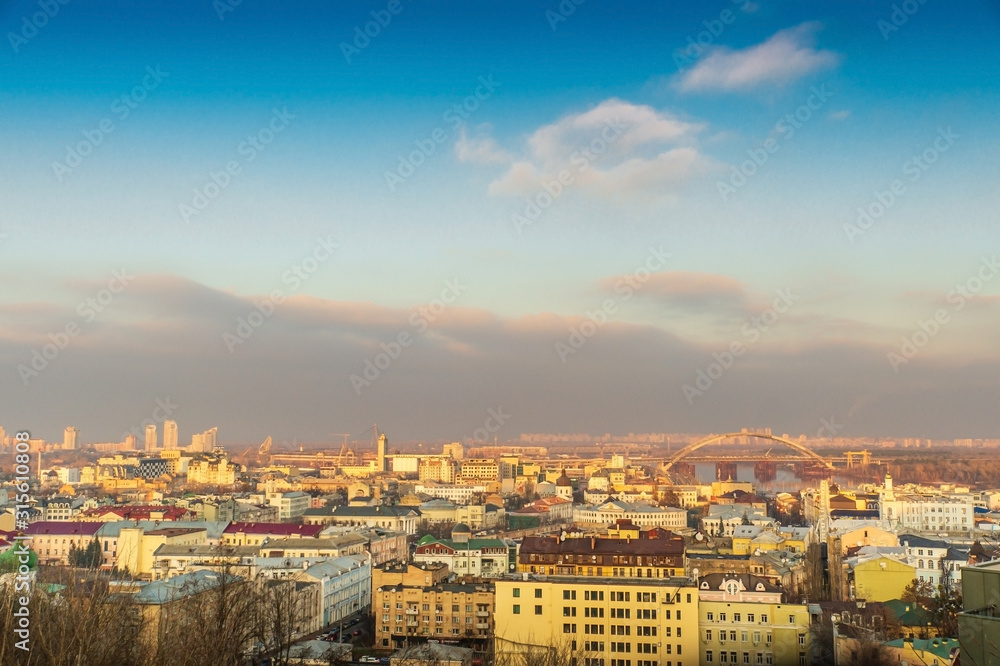 View from mountain of Dnieper river and the old city Kiev at sunset