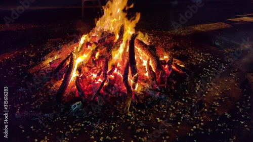 Giant bon fire lit for the festival of Lohri photo