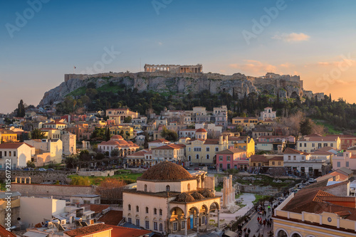 Athens old town Plaka and the Acropolis hill at sunset, Monastiraki Square, Athens, Greece photo