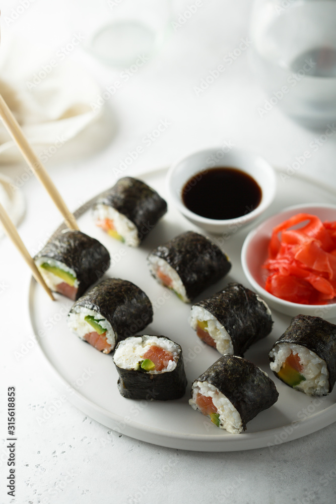 Homemade maki sushi with salmon Homemade maki sushi with salmon