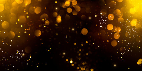 Golden abstract bokeh on black background. Holiday concept