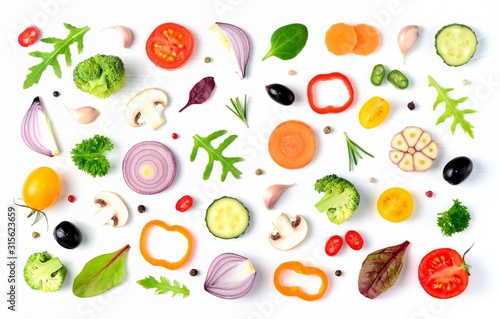 Food pattern with raw fresh ingredients of salad - tomato, cucumber, onion, herbs. Vegetables isolated on white background. Healthy eating concept. Flat lay, top view. 