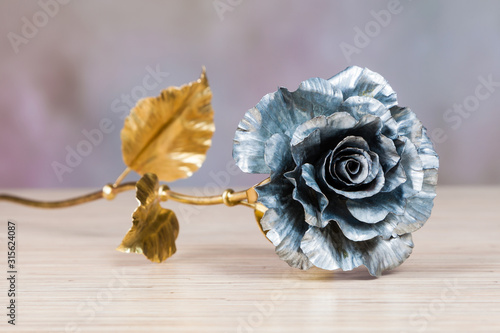 man made metal unfading rose  photo