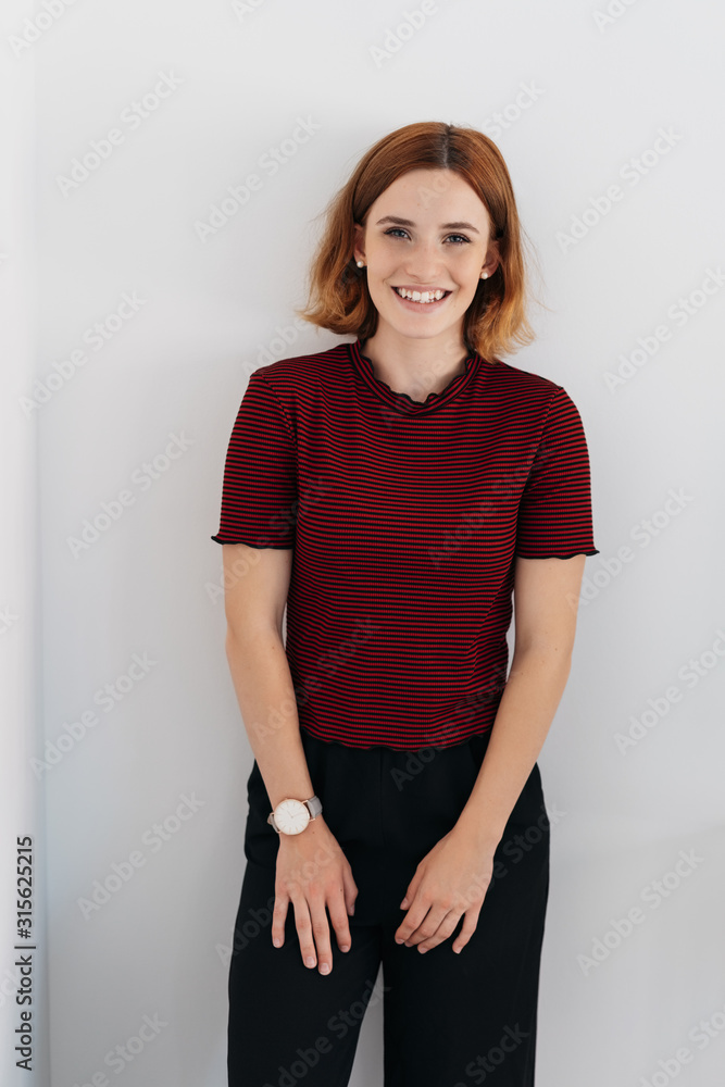Happy relaxed young woman with a friendly smile Happy relaxed young woman with a friendly smile