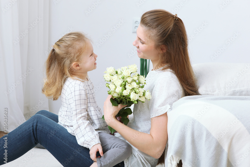 Mother's day concept. Mom and daughter at home Mother's day concept. Mom and daughter at home