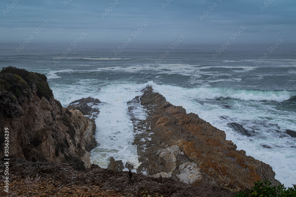 Waves crashing on rocks at Montana de Oro, California Waves crashing on rocks at Montana de Oro, California