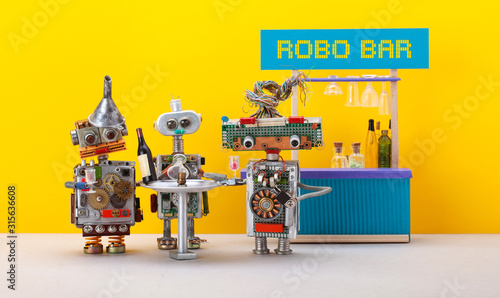 Three robots drink wine and have fun in a trendy Robo Bar club. Bar counter with drinks, metal table on a yellow background.