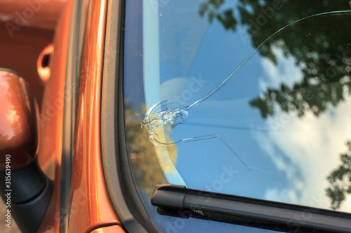 Close up broken car windshield glass from stone