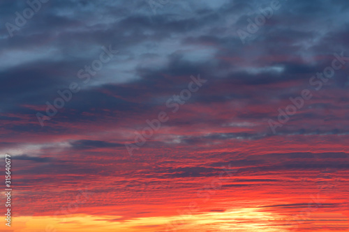 idyllic sunset. Beautiful sky, sunset landscape of a cold winter evening. © Luiza