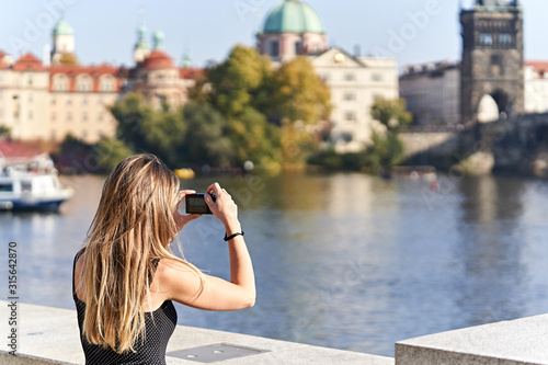 Canvas Print Female tourist in Prague