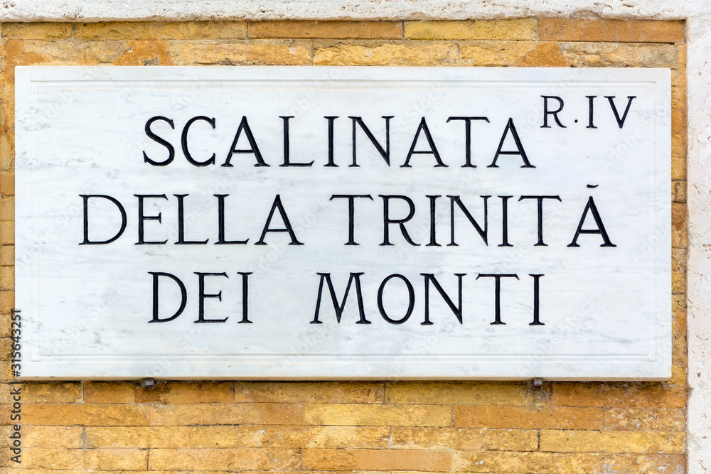 street sign on the wall in Rome, Italy