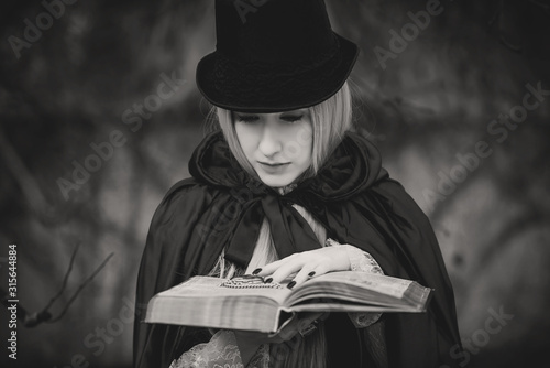 Aristocratic vampire cosplay, victorian gothic style. Halloween or masquerade ideas