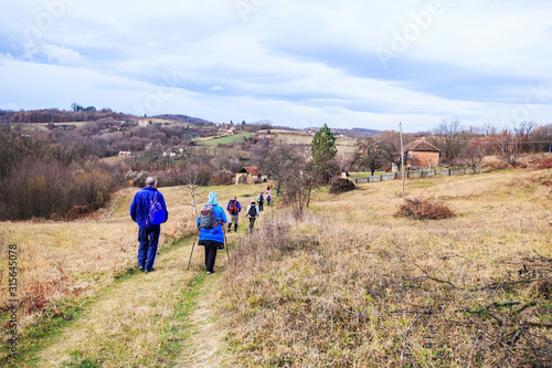 Hiking Group Of People Walking In Nature