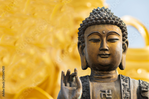 Fototapeta Buddha statue used as amulets of Buddhism religion.