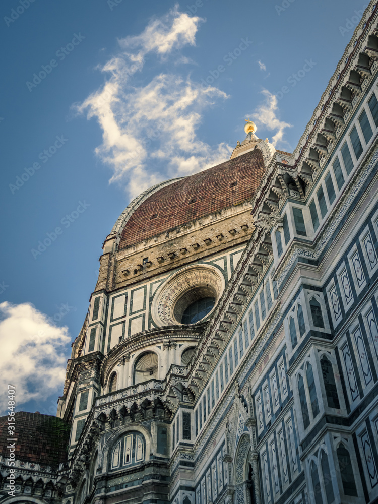 Detail of the cathedral of Florence with a blue sky