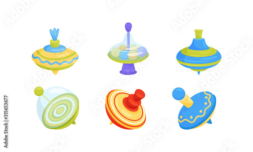 Whirligig Toy Vector Set. Colorful Childish Pegtop Collection