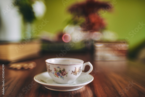 cup of tea on a elegant wooden table